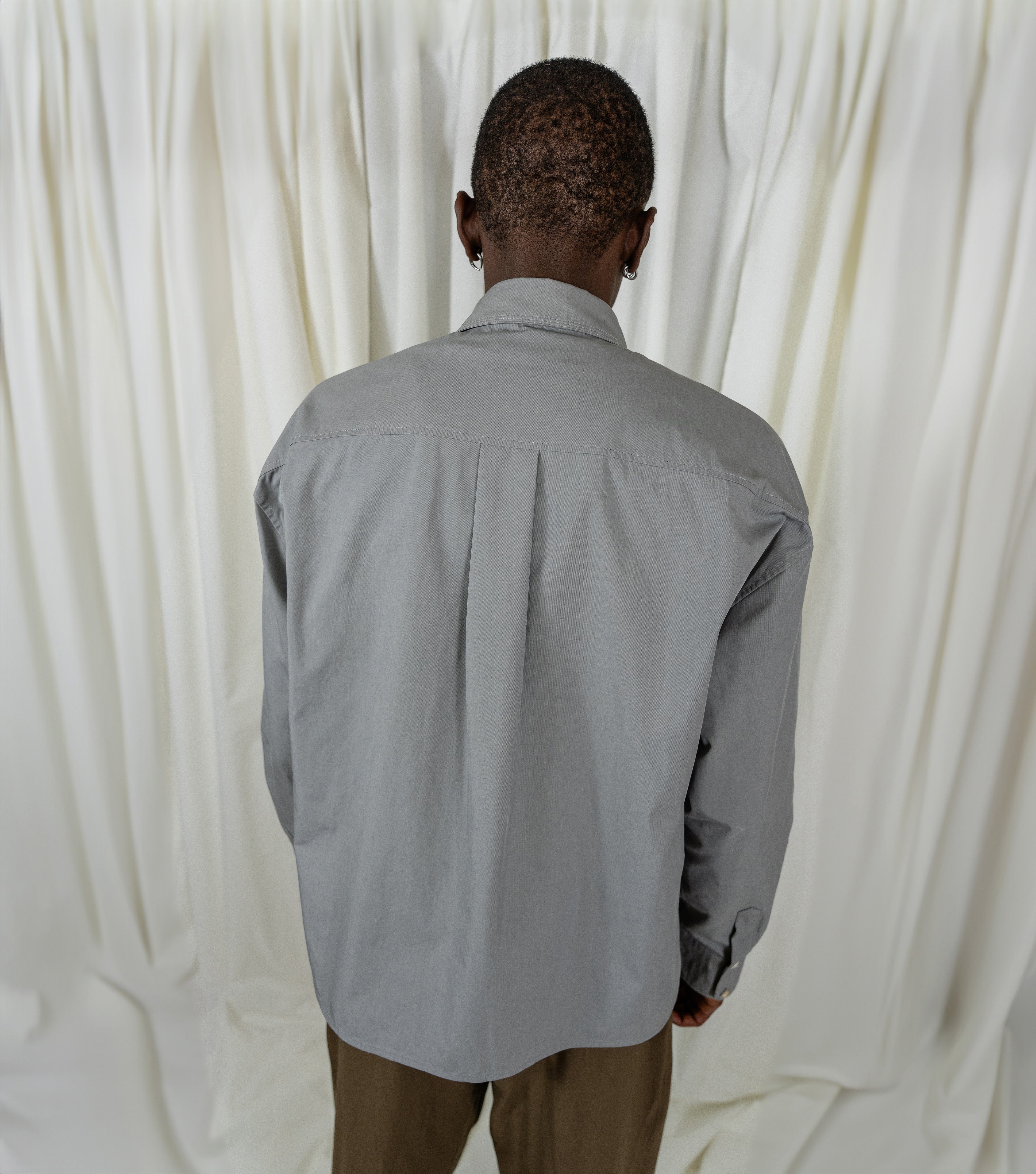 Grey Shirt with Diamond Shape Snap Buttons / Tripple Thread Collar and Pleated Back From Misela Studios -Backview