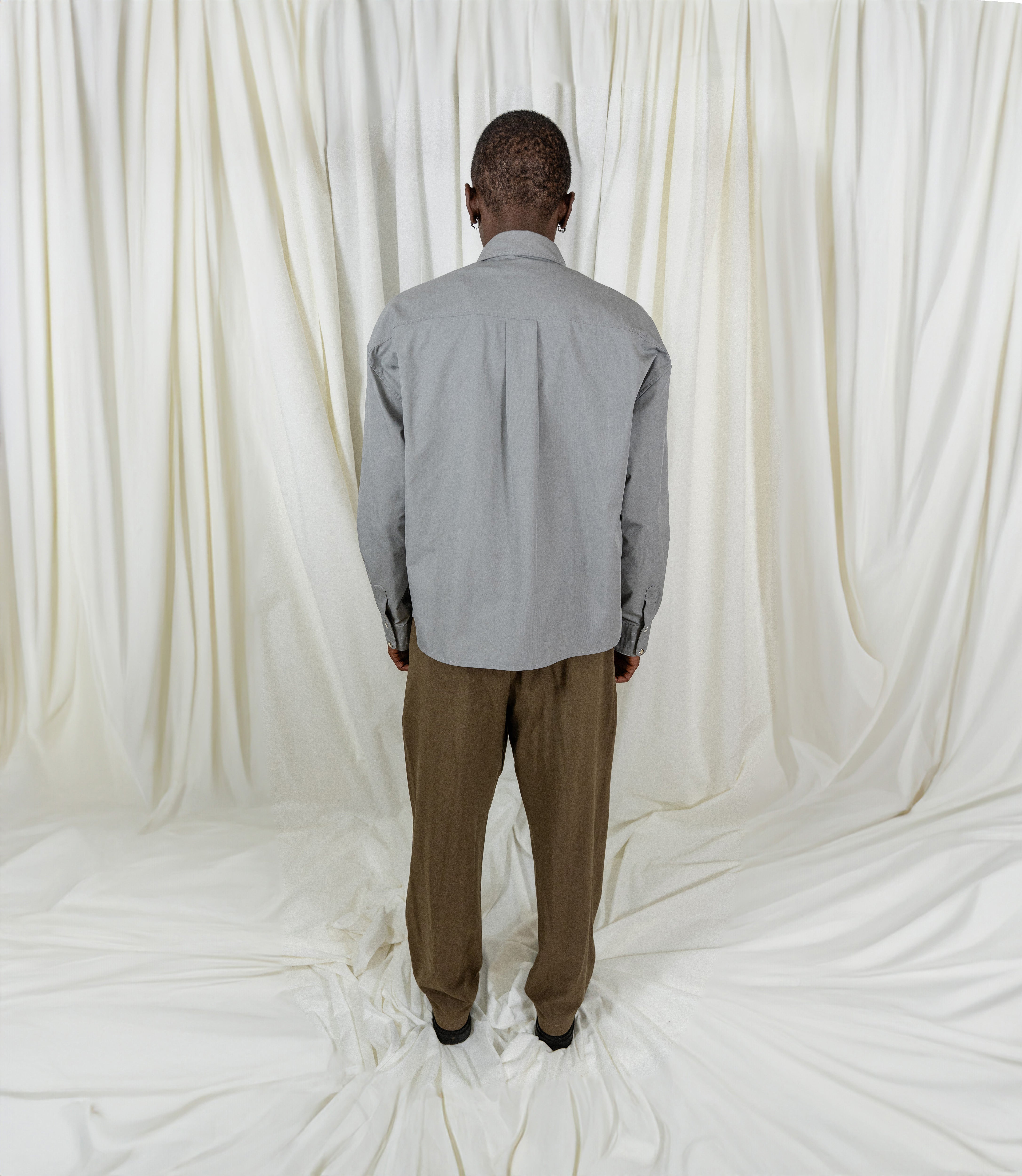 Grey Shirt with Diamond Shape Snap Buttons / Tripple Thread Collar and Pleated Back From Misela Studios -Backview