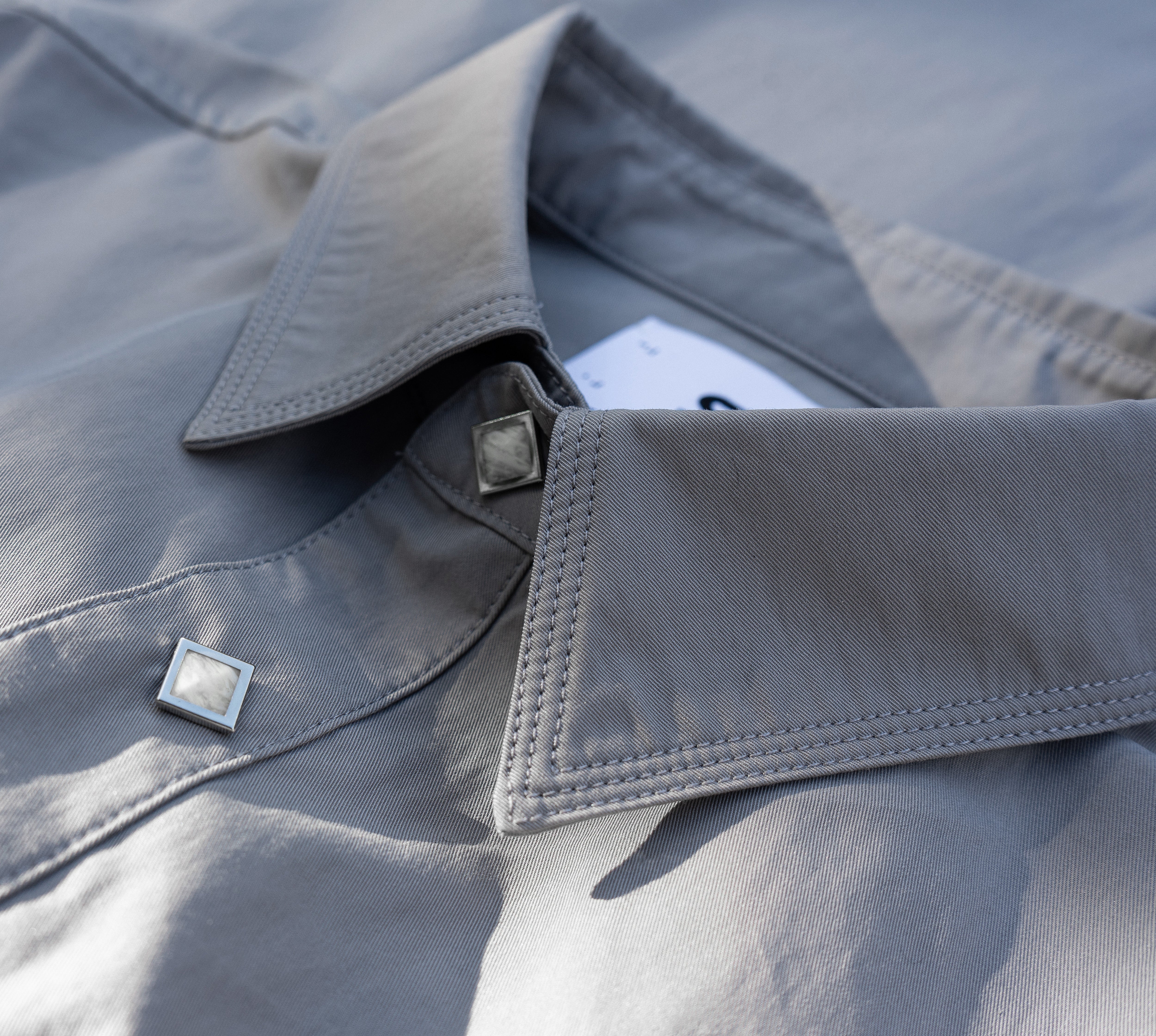 Grey Shirt with Diamond Shape Snap Buttons / Tripple Thread Collar and Pleated Back From Misela Studios -Backview